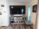 Living room with large TV and entertainment center at 8600 E Broadway Rd # 43, Mesa, AZ 85208