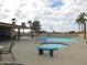 Community pool and spa with surrounding patio furniture at 8600 E Broadway Rd # 43, Mesa, AZ 85208