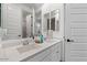 Modern bathroom with double sinks, stylish vanity, and updated fixtures at 904 E Hampton Ln, Gilbert, AZ 85295