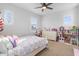 Charming bedroom with a full bed, dresser, and playful decor at 904 E Hampton Ln, Gilbert, AZ 85295