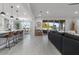 Open concept kitchen with white cabinets, quartz countertops, and island at 904 E Hampton Ln, Gilbert, AZ 85295