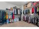 Large walk-in closet with ample shelving and hanging space at 904 E Hampton Ln, Gilbert, AZ 85295