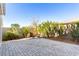 Spacious paved patio with seating area, perfect for outdoor entertaining at 10488 W Deanna Dr, Peoria, AZ 85382