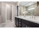Bathroom boasts double vanity and a large shower at 10488 W Deanna Dr, Peoria, AZ 85382