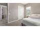 Cozy bedroom with sliding doors and window at 10488 W Deanna Dr, Peoria, AZ 85382
