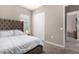 Bedroom with sliding door and access to another room at 10488 W Deanna Dr, Peoria, AZ 85382
