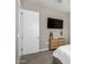 Spacious bedroom with TV and dresser at 10488 W Deanna Dr, Peoria, AZ 85382