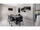Game room with poker table and view of kitchen at 10488 W Deanna Dr, Peoria, AZ 85382