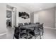 Game room with poker table and view into kitchen at 10488 W Deanna Dr, Peoria, AZ 85382