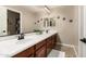 Bathroom with double vanity and large mirror at 11249 E Stradling Ave, Mesa, AZ 85212