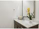 Bathroom with dark vanity and quartz countertop at 12465 E Soloman Rd, Gold Canyon, AZ 85118