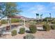 Community playground with play structures, picnic tables, and shaded seating at 12465 E Soloman Rd, Gold Canyon, AZ 85118