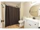 Clean bathroom with a white vanity and shower at 13558 W Saguaro Ln, Surprise, AZ 85374