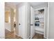 Ample linen closet with shelving, offering extra storage space at 13558 W Saguaro Ln, Surprise, AZ 85374