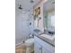 Updated bathroom, featuring a walk-in shower, granite vanity, and white subway tile at 13801 N 57Th St, Scottsdale, AZ 85254