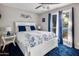 Charming bedroom with a queen-size bed and blue accents at 13801 N 57Th St, Scottsdale, AZ 85254