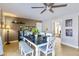 Bright dining area with a farmhouse-style table and comfortable seating for six at 13801 N 57Th St, Scottsdale, AZ 85254