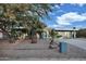Ranch-style home with desert landscaping and a spacious front yard at 13801 N 57Th St, Scottsdale, AZ 85254
