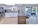 Updated kitchen with granite countertops, stainless steel appliances, and island at 13801 N 57Th St, Scottsdale, AZ 85254