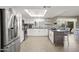 Modern kitchen featuring stainless steel appliances and an island at 13801 N 57Th St, Scottsdale, AZ 85254