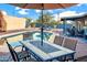 Inviting backyard oasis with a sparkling pool and patio furniture at 13801 N 57Th St, Scottsdale, AZ 85254
