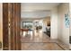 Bright and spacious entryway with tile floors and pool table at 13814 E Yolantha St, Scottsdale, AZ 85262