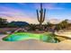 Inviting pool with a desert landscape backdrop at 13814 E Yolantha St, Scottsdale, AZ 85262