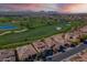 Aerial view of house and luxury community near golf course at 1401 E Sweet Citrus Dr, Queen Creek, AZ 85140