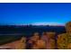 Scenic view of a lush golf course at sunset at 1401 E Sweet Citrus Dr, Queen Creek, AZ 85140