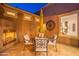 Cozy patio seating area with fireplace and outdoor furniture at 1401 E Sweet Citrus Dr, Queen Creek, AZ 85140