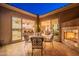 Outdoor patio space with view into kitchen and fireplace at 1401 E Sweet Citrus Dr, Queen Creek, AZ 85140