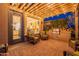 Covered patio with seating, string lights, and grill at 1401 E Sweet Citrus Dr, Queen Creek, AZ 85140