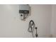 Garage with installed solar power and a charger for an electric vehicle at 1416 E Artemis Trl, Queen Creek, AZ 85140