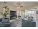 Cozy living area with furniture, a flat screen TV, and access to the patio at 1416 E Artemis Trl, Queen Creek, AZ 85140