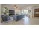 Inviting living room featuring stylish furniture and sliding glass doors at 1416 E Artemis Trl, Queen Creek, AZ 85140