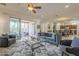Spacious living room with seamless indoor-outdoor living spaces at 1416 E Artemis Trl, Queen Creek, AZ 85140