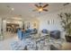 Open-concept living room connected to dining area and kitchen space at 1416 E Artemis Trl, Queen Creek, AZ 85140