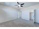 Bedroom with ceiling fan and carpet at 14877 N 145Th Dr, Surprise, AZ 85379
