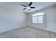 Bedroom with ceiling fan and carpet at 14877 N 145Th Dr, Surprise, AZ 85379