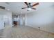 Bright bonus room featuring tile floors and laundry area at 14877 N 145Th Dr, Surprise, AZ 85379