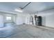 Garage with extra storage space and water heater at 14877 N 145Th Dr, Surprise, AZ 85379