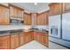 Modern kitchen with granite countertops and stainless steel appliances at 14877 N 145Th Dr, Surprise, AZ 85379