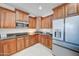 Modern kitchen with granite countertops and stainless steel appliances at 14877 N 145Th Dr, Surprise, AZ 85379
