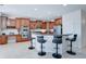 Modern kitchen with granite countertops, stainless steel appliances, and an island at 14877 N 145Th Dr, Surprise, AZ 85379