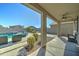 Relaxing covered patio overlooking the refreshing pool at 14877 N 145Th Dr, Surprise, AZ 85379