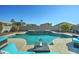 Large, refreshing pool with ample surrounding patio space at 14877 N 145Th Dr, Surprise, AZ 85379