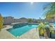 Inviting backyard pool perfect for relaxation and entertaining at 14877 N 145Th Dr, Surprise, AZ 85379