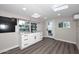 Stylish basement bar featuring granite and sleek cabinetry at 15787 E Tumbleweed Dr, Fountain Hills, AZ 85268