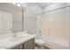Clean bathroom, featuring a shower/tub combo and updated vanity at 1719 W Owens Way, Anthem, AZ 85086
