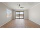 Dining room with tile floors, sliding glass doors, and ceiling fan at 1719 W Owens Way, Anthem, AZ 85086